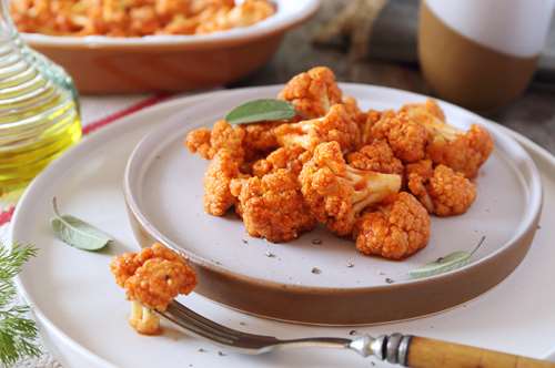 Κουνουπίδι Κοκκινιστό με Πιπεριές και Ρύζι