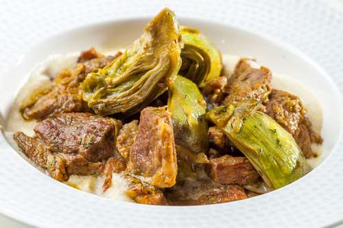 Κατσικάκι στο Φούρνο με Αγκινάρες