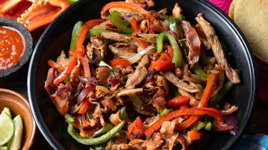 Χοιρινό με Πιπεριές και Βελουδένια Σάλτσα