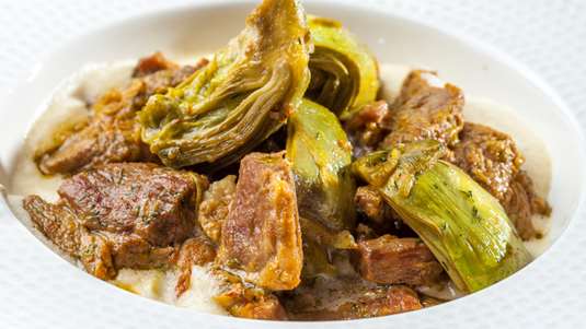 Κατσικάκι στο Φούρνο με Αγκινάρες